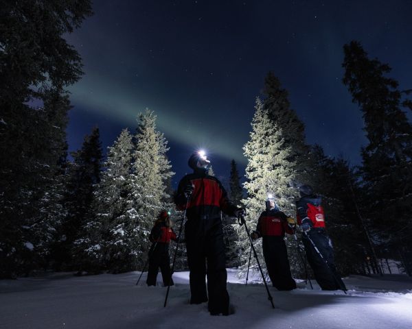 Northern lights search on snbowshoes in Ruka, Lapland