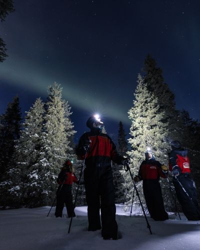 Northern lights search on snbowshoes in Ruka, Lapland